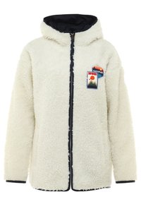 Luddigt vit fleecjacka med huva, dragkedjeslutning och två färgglada lappar på framsidan. Har svart trim och muddar.