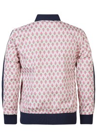 Veste bomber à motif floral avec un fond rose clair, ornée de fleurs roses et vertes, col et poignets en bord-côte bleu marine, taille élastique.