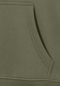 Olive green hoodie features a kangaroo pocket, ribbed hem, and textured fabric. Stitching details enhance structural integrity.