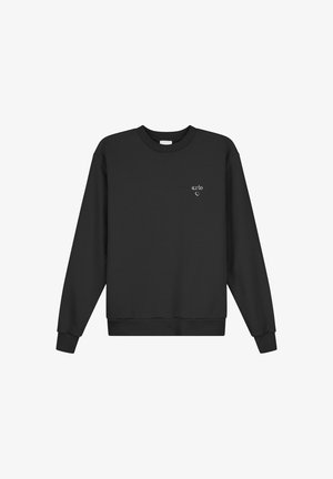 Felpa nera realizzata in tessuto misto cotone. Presenta un collo rotondo, maniche lunghe, polsini a coste e un piccolo logo sul petto.