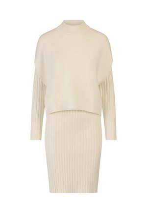 Hellbeige Strickkleid mit Stehkragen, kurzem Schnitt und gerippter Textur. Verfügt über lange Ärmel mit horizontalem Rippenmuster und einem geschichteten Design.