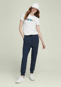 Wilson SLIM JOGGER - Pantalones deportivos - classic navy