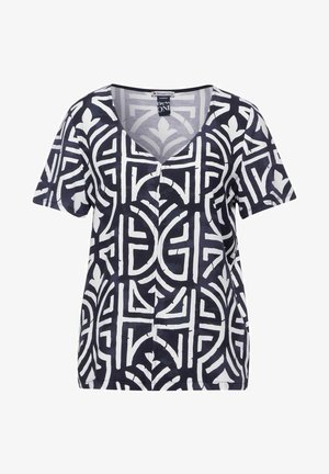 Haut à manches courtes et col en V, en bleu marine et blanc, présentant un motif géométrique avec des lignes et des formes audacieuses, fabriqué en tissu léger.