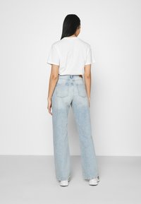 NA-KD FULL LENGTH  - Laisvo kirpimo džinsai - light blue