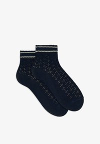 Selezionato, oltremare