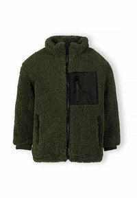 Veste en polaire verte avec fermeture éclair à l'avant, col haut et poche en tissu noir. Comprend des poches latérales et des poignets côtelés pour le confort.