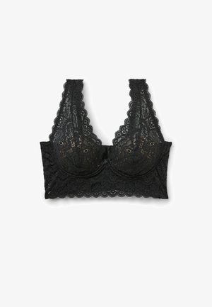 Soutien-gorge en dentelle noire avec un bord festonné, des bonnets non rembourrés, de larges bretelles en dentelle et des motifs floraux. Texture douce avec des accents détaillés.