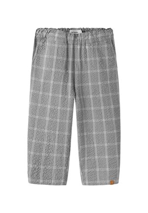 Halli ruudulise mustriga tikitud püksid, elastse vöökohaga, küljetaskutega ja väike pruun kaubamärgiga silt hemmi ääres.