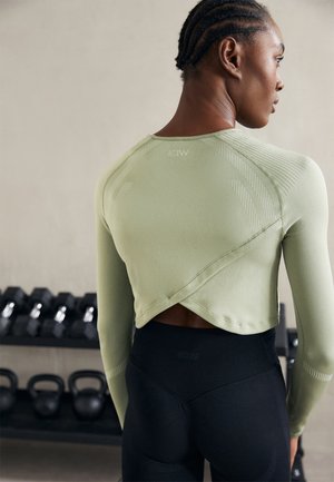 ICANIWILL IMPACT SEAMLESS CROP - Long sleeved top - light leaf green