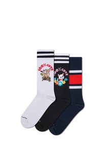Trzy pary skarpetek do kolan: białe w czarne paski i wzór z jeleniem, czarne z kwiatami i napisem "100% urocze", granatowe z czerwonymi paskami.