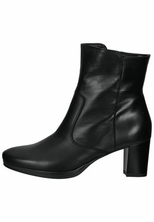 Black leather ankle boot with a fitted design, rounded toe, and a block heel. Smooth texture with minimal stitching details.