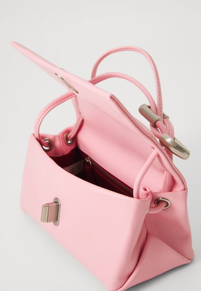 Light pink leather handbag with top flap open, silver clasp, adjustable strap, and visible interior zipper pocket.
