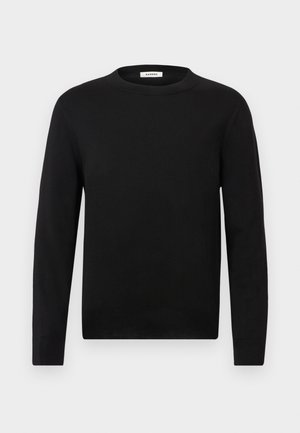 Jersey de manga larga negro con cuello redondo, puños y dobladillo acanalados, mostrado sobre un fondo gris claro liso.