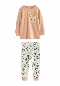 Two-piece pajama set: peach long-sleeve top with bunny pocket detail; light green pants with multicolored leopard print, elastic waistband.