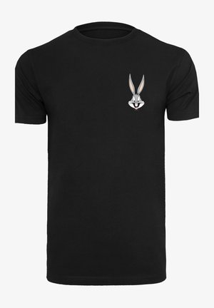 Černé bavlněné tričko s barevným potiskem Bugs Bunny na levé straně hrudi. Jednoduchý kulatý výstřih a krátké rukávy.