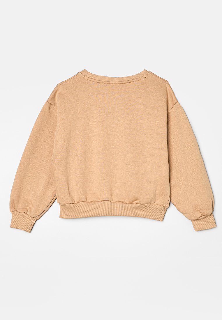 Sudadera beige de corte relajado, con cuello redondo y cintura fruncida. Presenta mangas largas tipo globo con puños acanalados. Textura suave.