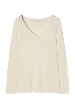 White knitted sweater with long sleeves and a V-neck. Features a textured finish and ribbed hems. Tag visible at the neckline.