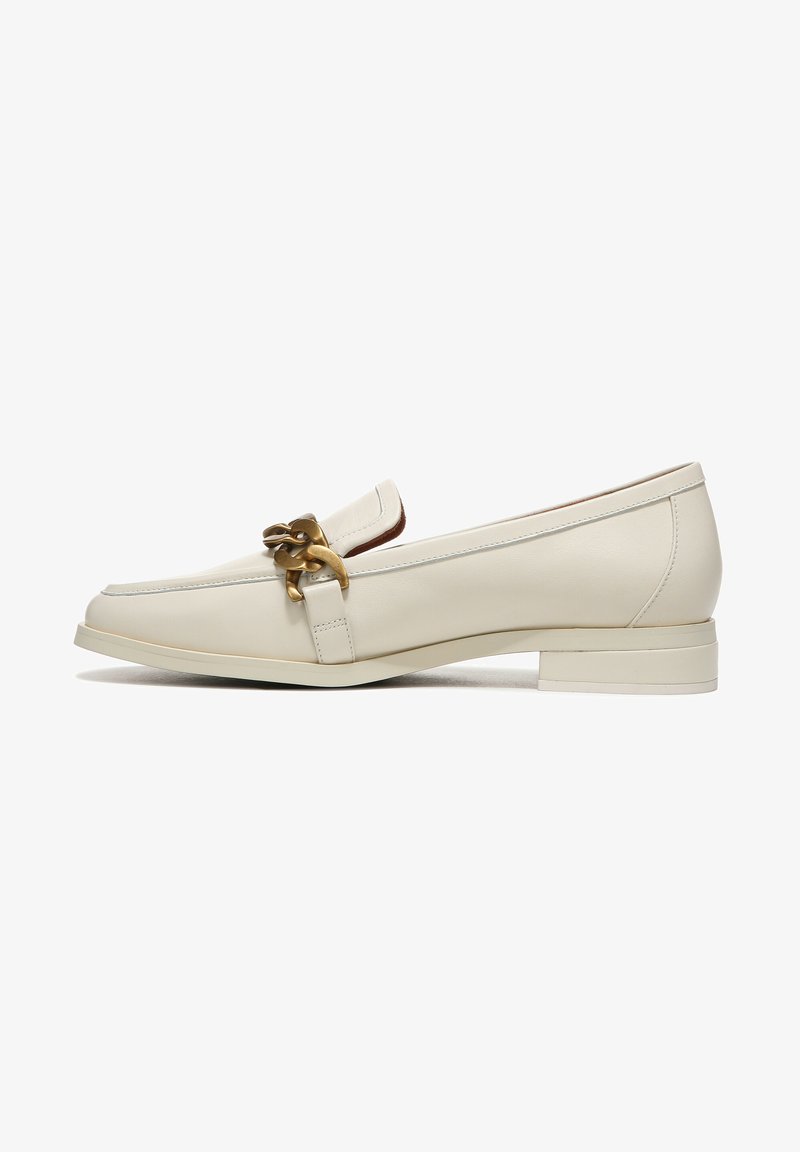 Light beige leather loafers with a low block heel, featuring a decorative gold chain accent and clean stitching details.