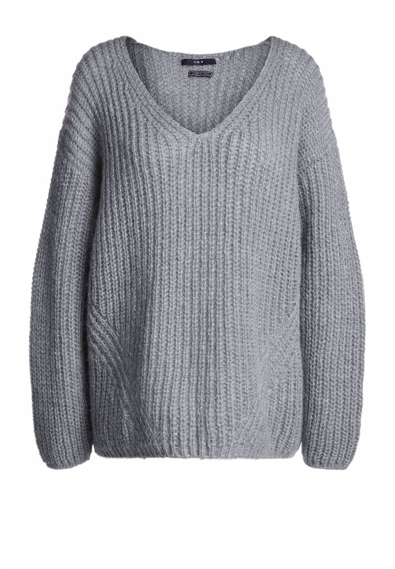 Pull gris en maille avec encolure en V, coupe oversize et motif côtelé texturé. Manches longues et silhouette décontractée, idéal pour superposer.