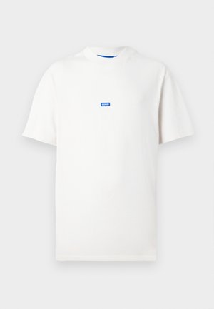 White short-sleeve T-shirt with a small blue rectangular logo reading "HUGO" centered on the chest, plain background.