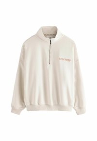 Heled beez, tõmblukuga poolkõrge särk. Omab ribikattega varrukaid ja allääri, oranžide "SELF ATHLEISURE EST. 2023" brodeeringut. Pehme kangas.