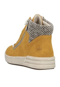 Rieker Boots à talons - gelb