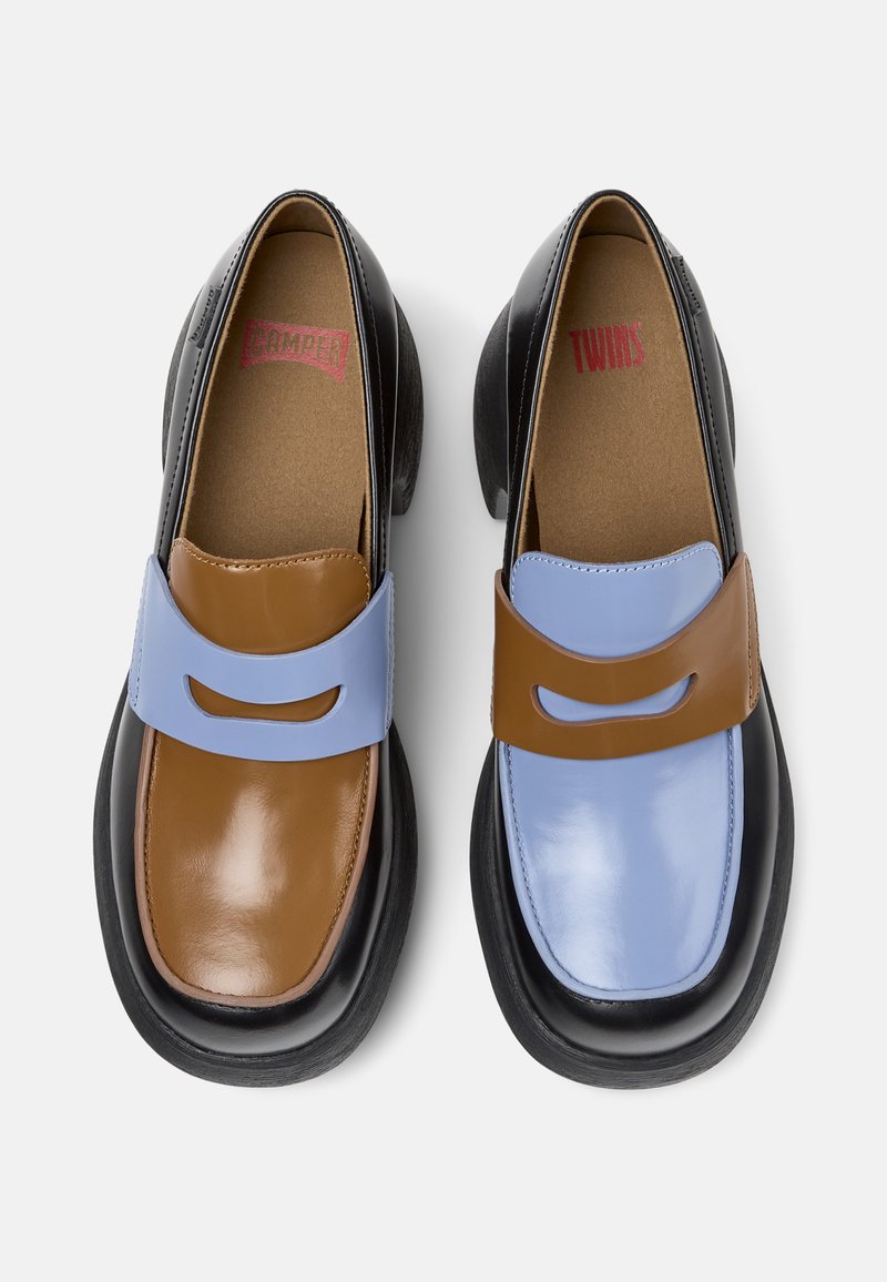 Brown and blue leather loafers with a black sole, featuring a cut-out accent on the strap and a smooth, glossy finish.