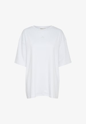 Fehér, rövid ujjú póló, puha pamutból készült. Kerek nyakkivágással és laza szabással rendelkezik, az elején minimális márkázással.