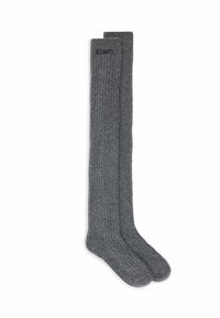 Grijze geribbelde kniekousen met een zachte, textuurafwerking en subtiele branding op de bovenband. Gemaakt van een comfortabele gebreide stof.