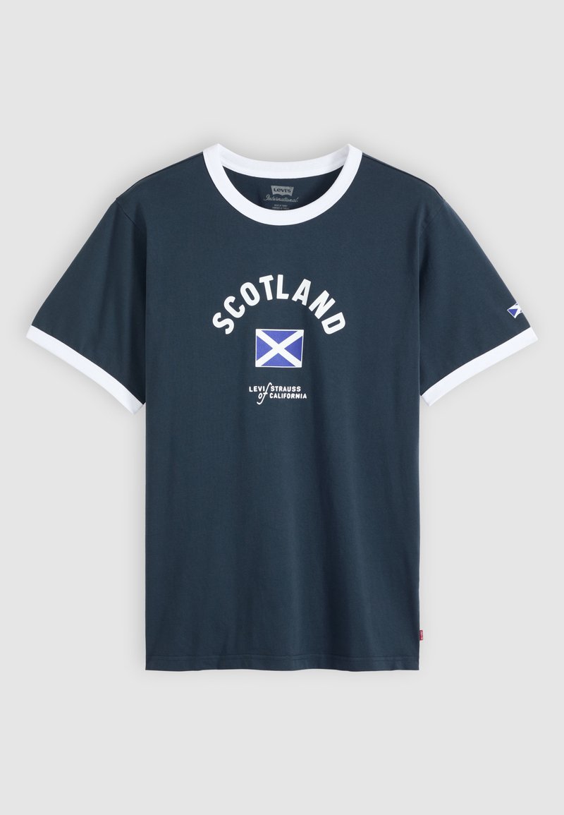 Navy blue T-shirt with white trim, "SCOTLAND" text, Scottish flag graphic, and "Levi Strauss California" logo on the front and sleeve.