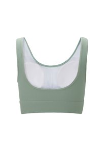 Meka meka zelena sportbra sa širokim izrezom, debelim trakama i glatkom bijelom unutrašnjošću. Ima prilagođen dizajn i elastičnu traku.