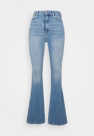 Jasnoniebieskie jeansy z denimu z wysokim stanem, zapinane z przodu na guzik i zamek błyskawiczny, z rozszerzanymi nogawkami.