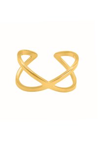 Bague en métal doré au ton or, présentant un design ouvert avec des lignes intersectantes, une texture lisse et des bords arrondis, créant un look minimaliste.