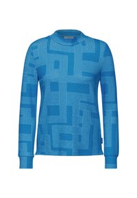 Langarm-Turtleneck-Pullover in leuchtendem Blau mit einem geometrischen Muster aus weißen Linien. Weicher Stoff mit gerippten Manschetten und Kragen.