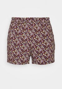 Shorts made of lightweight fabric featuring a multicolored floral pattern on a dark background, with an elastic waistband and loose fit.