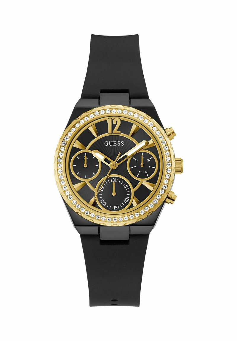 Orologio con cinturino in silicone nero e dettagli dorati, quadrante nero, bezel in cristallo, tre sotto-quadranti e marcatori delle ore in evidenza. Presenta un 12 in alto.