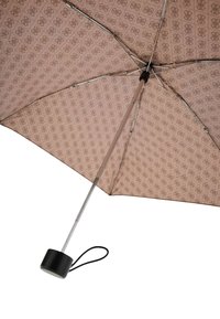 Ombrello compatto beige con motivo, dotato di ossature metalliche e un manico cilindrico nero con cinturino da polso.