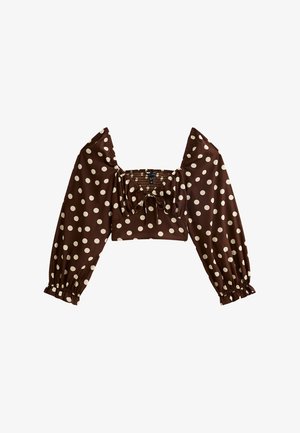 Top corto a pois marrone con maniche lunghe a palloncino, scollatura quadrata e dettagli arricciati nel corpino. Il tessuto è liscio con una leggera lucentezza.