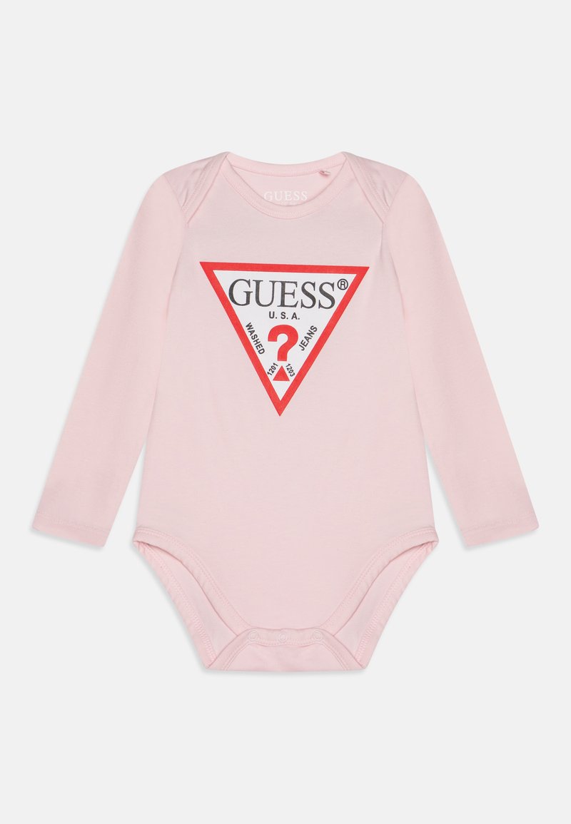 Light pink long-sleeve bodysuit with a triangular red graphic featuring "GUESS U.S.A" and a question mark, made from soft cotton material.
