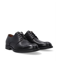 Schwarze Lederdressschuhe mit glatter Oberfläche, runder Zehenform und Schnürdesign. Sie verfügen über einen niedrigen Absatz und eine strukturierte Gummi-Außensohle.