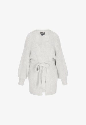 Helehall cardigan, mis on valmistatud tekstuuriga kudumist, V-kaelusega, vööga taljes ja puffvarrukatega. Avatud esiosa ja langetatud õlad.