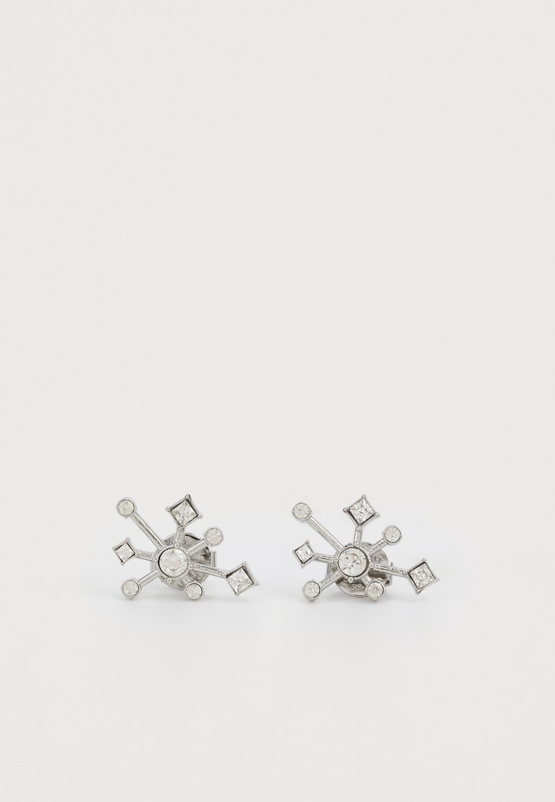 Silver earrings with a geometric design featuring circular and square clear gemstones, creating a starburst effect with varied textures.