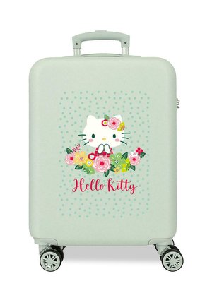 Maleta rígida de color verde claro con cuatro ruedas, con la cara de Hello Kitty adornada con flores y rodeada de decoraciones florales.
