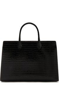 Sac à main en cuir noir embossé crocodile, de forme structurée, avec une texture lisse et deux poignées arrondies. Il présente une finition brillante.