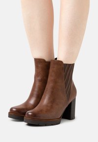 Marco Tozzi Platform ankle boots - chestnut