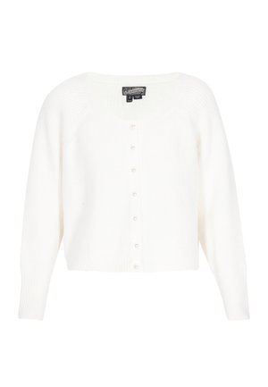 Balts ribēts kardigāns, izgatavots no mīksta materiāla, ar izgrieztu kakla izgriezumu un pērlēm līdzīgu pogu rindām priekšpusē. Garas piedurknes ar pieguļošiem aprocēm.