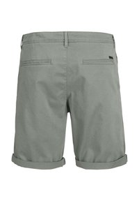 Light gray cotton shorts featuring a rolled hem, two back pockets, and a simple waistband with a small logo tag.