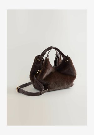 Dark brown handbag featuring a textured fur body, leather accents, dual handles, and a detachable shoulder strap.