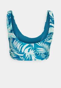 Top de bikini com estampa tropical, apresentando decote arredondado e alças largas, feito de um tecido suave, elástico e de secagem rápida.