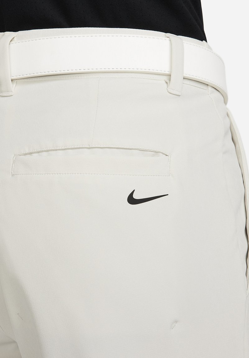 white nike golf pants